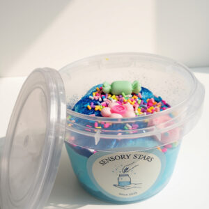slime with sprinkles and small toys in a jar